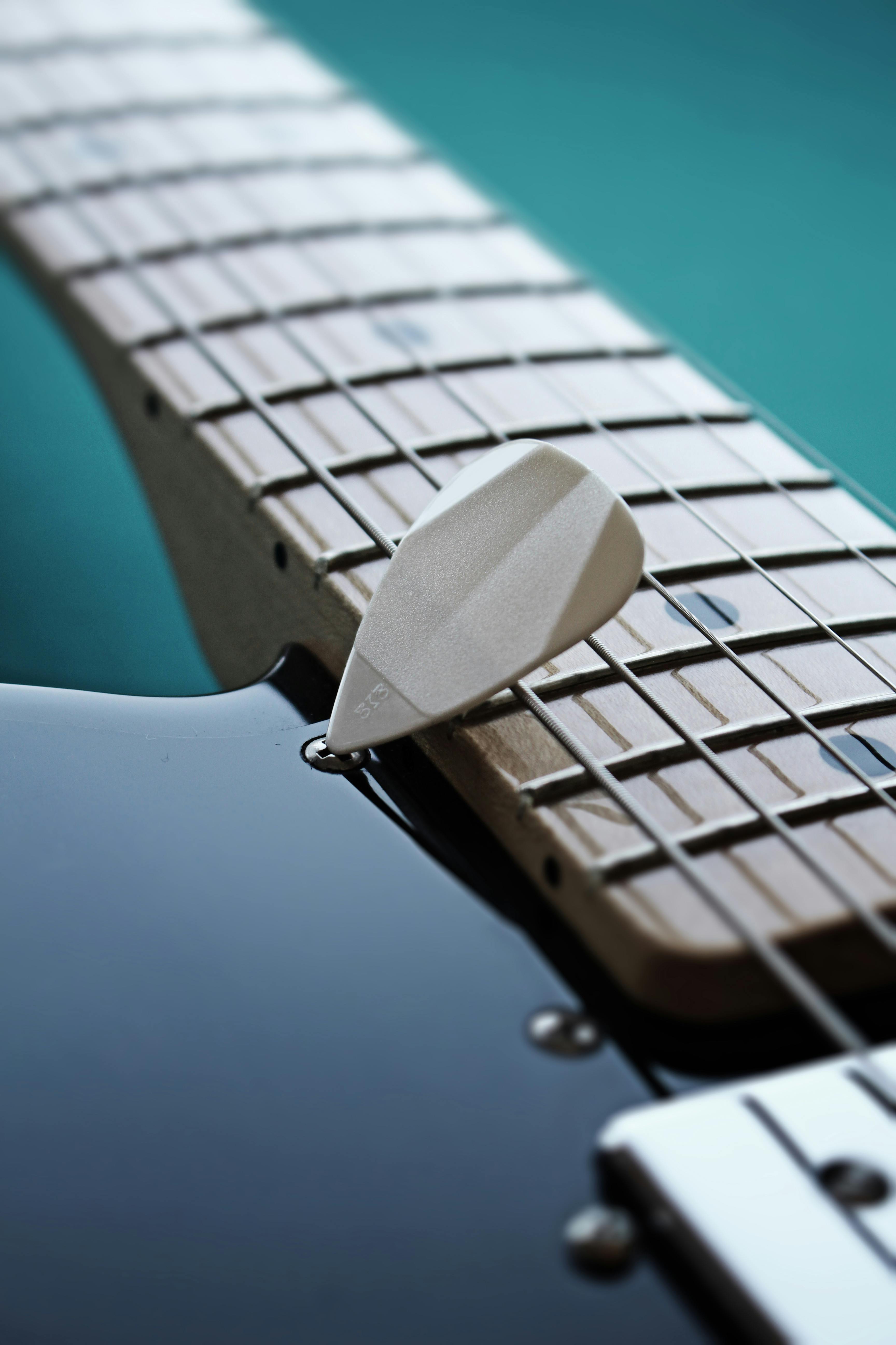 Guitar with electronic tuner for tuning